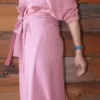 Amanda dancing in a rose maxi dress