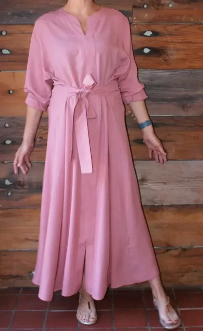 Amanda wearing a rose maxi dress to a wedding
