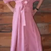 Model showing the front detail of a Rose Maxi dress
