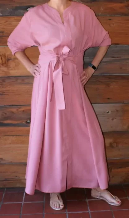 Model showing the front detail of a Rose Maxi dress