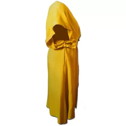 Side profile of a Ochre coloured Kaftan Dress