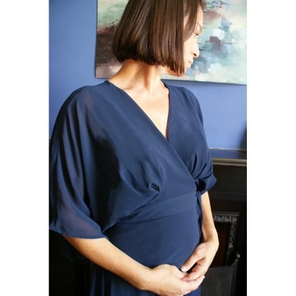 Side view of a navy blue dress by Nucleus clothing