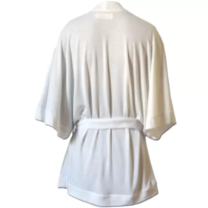 A beautiful knit wrap cardigan in white, with kimono like sleeves and a fabric tie belt with a curved front hem.