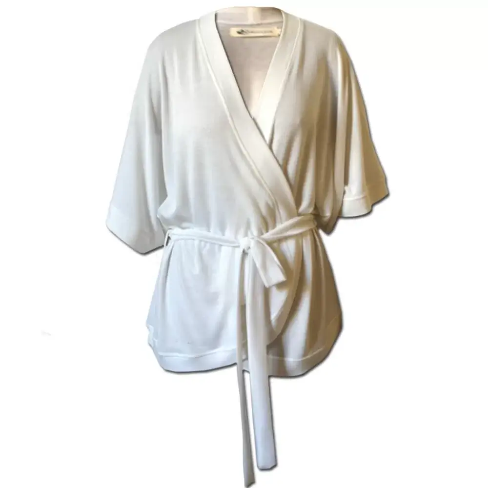 Knitwear for Every Body: How to Dress for Work, Weekends & Beyond 59 kimono like sleeves wrap white cardigan with a curved front hem