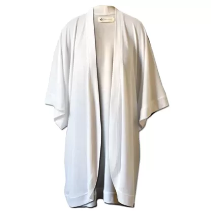 Open white cardigan with kimono like sleeves and a fabric tie belt