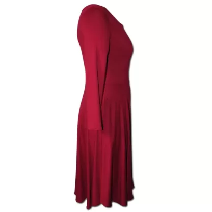 Side view of a Dance Dress in Wine with a fitted torso and long sleeves and side pockets