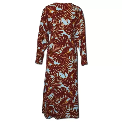 The Everywhere Dress in Maroon Leaves is a maxi dress with a built in tie belt that pulls the dress together with a tie in front. The front neck is bordered with same fabric facing and the long skirt has a centred small slit at the bottom. It as long sleeves. Back view