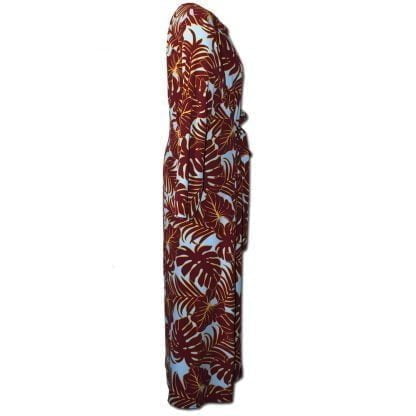The Everywhere Dress in Maroon Leaves is a maxi dress with a built in tie belt that pulls the dress together with a tie in front. The front neck is bordered with same fabric facing and the long skirt has a centred small slit at the bottom. It as long sleeves. Side view