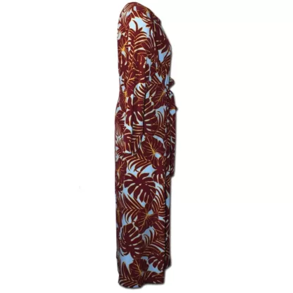 The Everywhere Dress in Maroon Leaves is a maxi dress with a built in tie belt that pulls the dress together with a tie in front. The front neck is bordered with same fabric facing and the long skirt has a centred small slit at the bottom. It as long sleeves. Side view